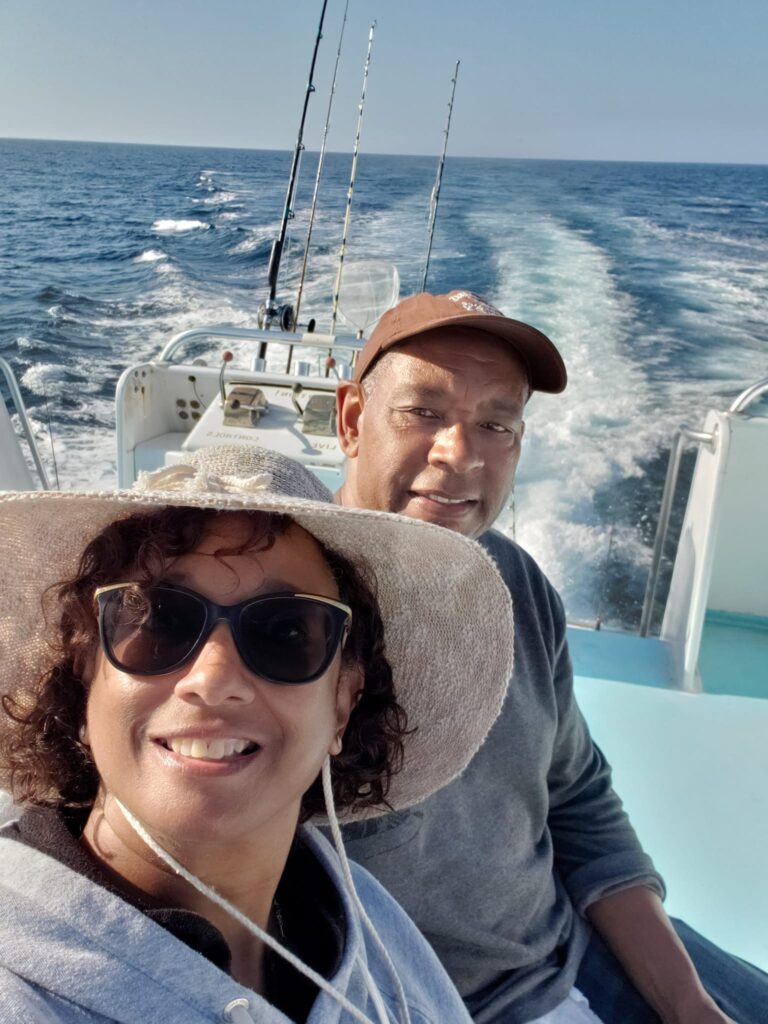 Coach Debs and Husband on boat.